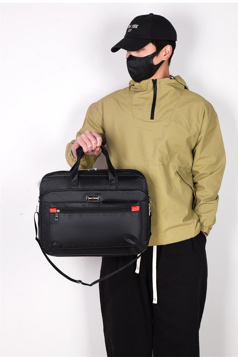 Men's IBG lightweight laptop briefcase with multiple compartments for business travel, made of durable materials.