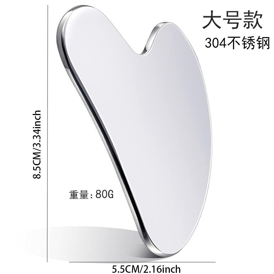 IBG stainless steel Gua Sha massage tool for facial and skincare, with smooth, polished surface for gentle skin massage.