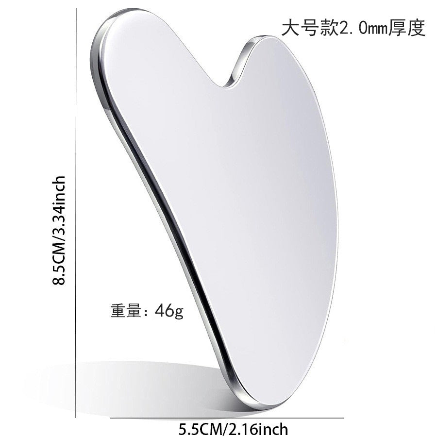 IBG stainless steel Gua Sha massage tool for facial and body skin care, with smooth, polished surface for gentle massage.