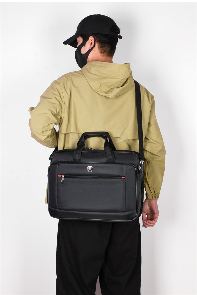 Men's IBG lightweight laptop briefcase with handle and shoulder strap, suitable for business travel and professional use.