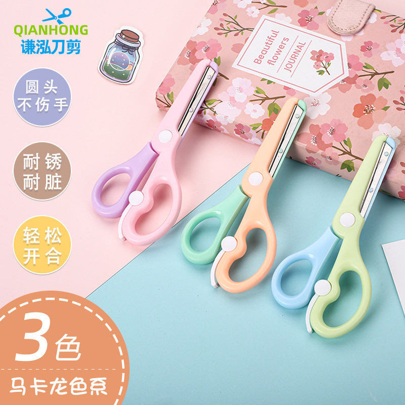 Kids safety scissors with macaron-colored handles, ideal for children’s crafts, from IBG in a playful, colorful design.