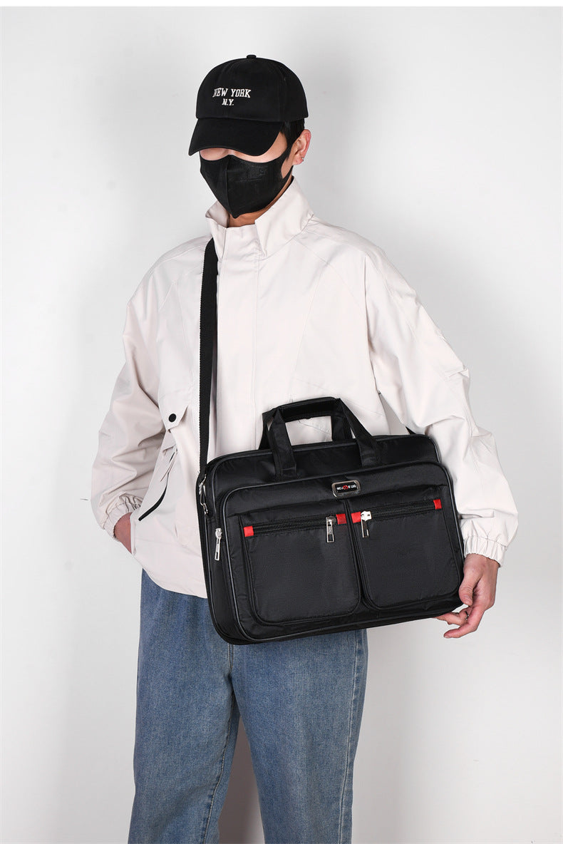 Men's lightweight IBG laptop briefcase with handles and shoulder strap, ideal for business travel and professional use.