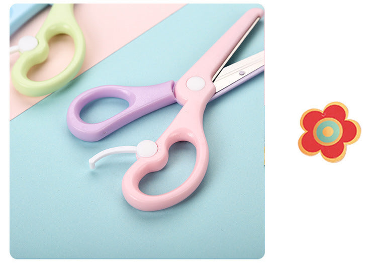 Kids safety scissors by IBG in pastel macaron colors, designed for children and school use, with rounded tips for safety.