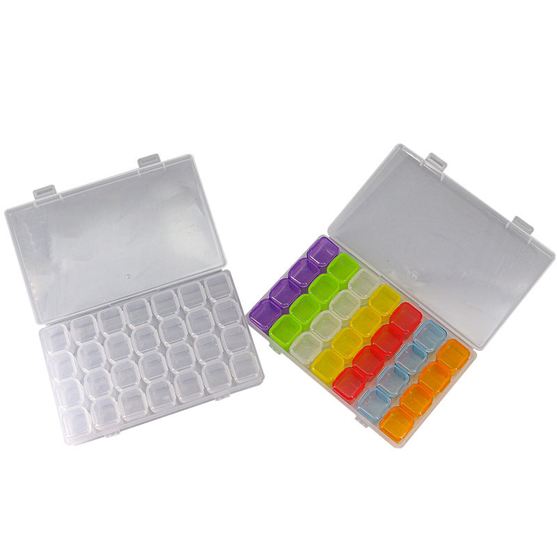 Transparent IBG jewelry storage box with multiple compartments for organizing necklaces, rings, and earrings.