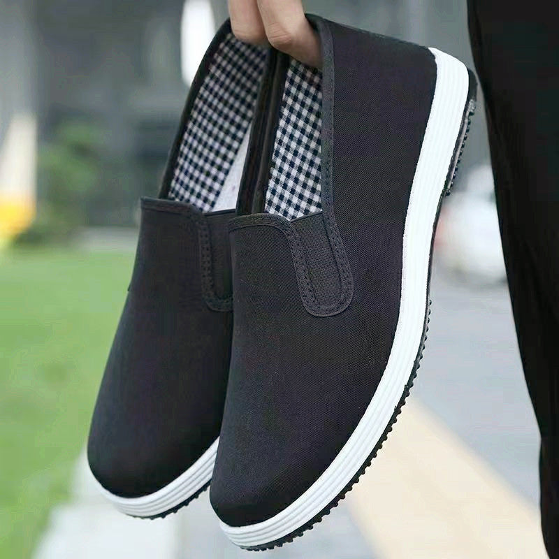 IBG breathable canvas slip-on shoes featuring non-slip casual flats for comfortable everyday wear.