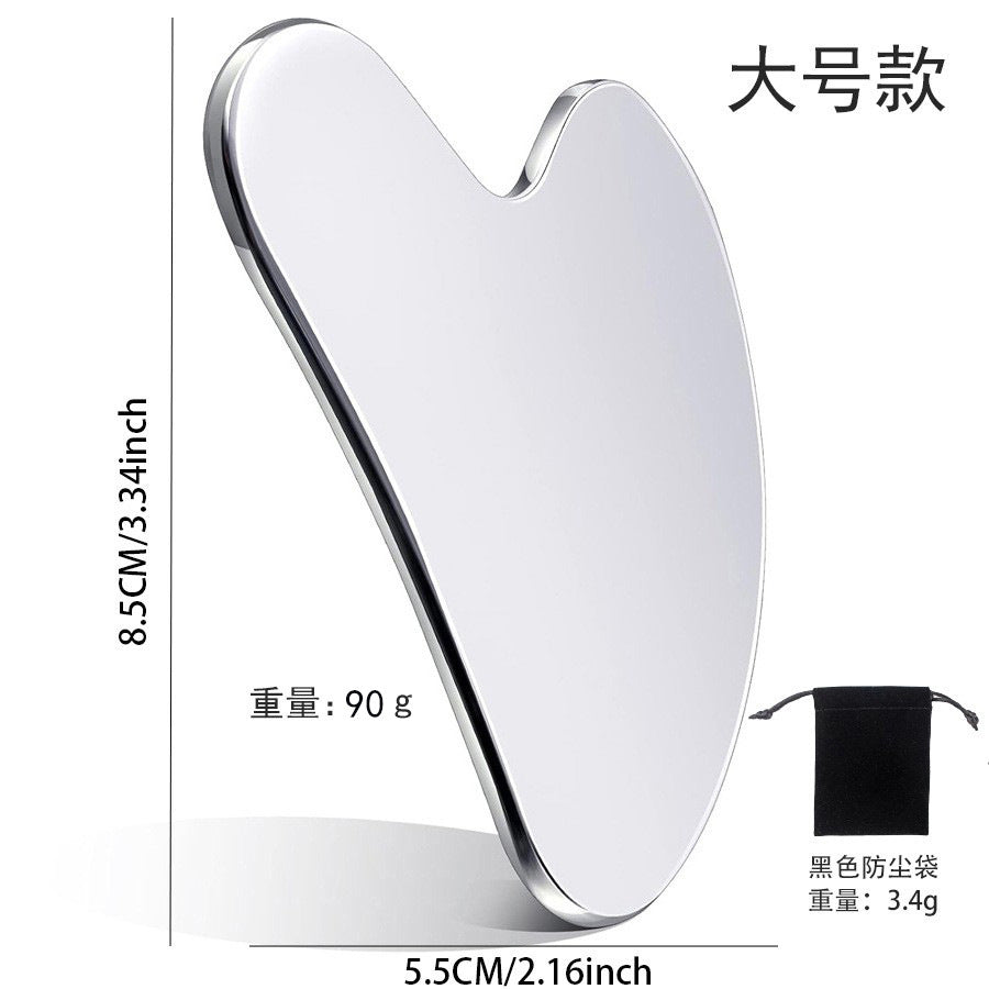 IBG stainless steel Gua Sha massage tool for beauty and personal care, shown with smooth, polished surface on a white background.