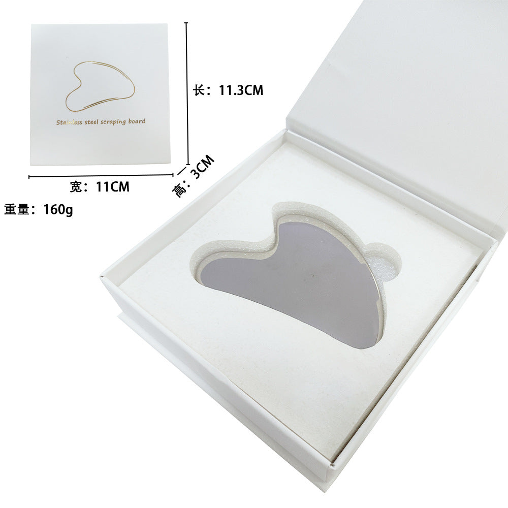 IBG stainless steel Gua Sha massage tool for facial and body skincare, with smooth, polished surface for facial massage and skin relaxation.