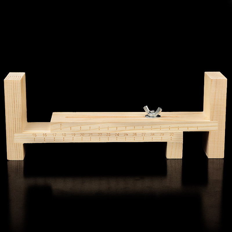 Wooden bracelet weaving stand for DIY jewelry making by IBG, showcasing a sturdy wooden frame for bracelet weaving projects.