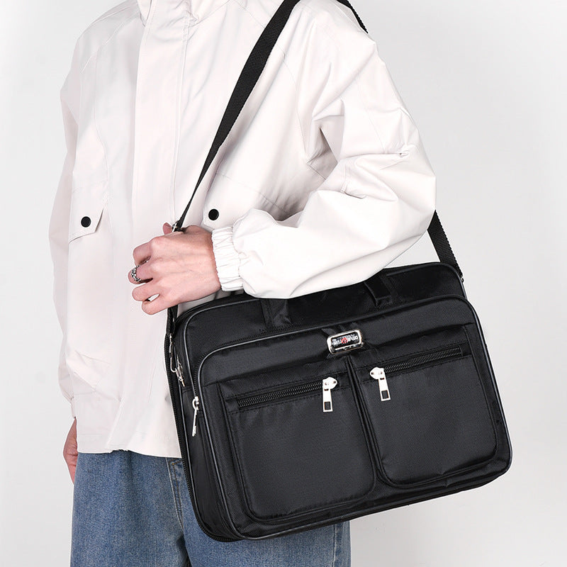 Men's lightweight IBG laptop briefcase with multiple compartments, ideal for business travel and professional use.