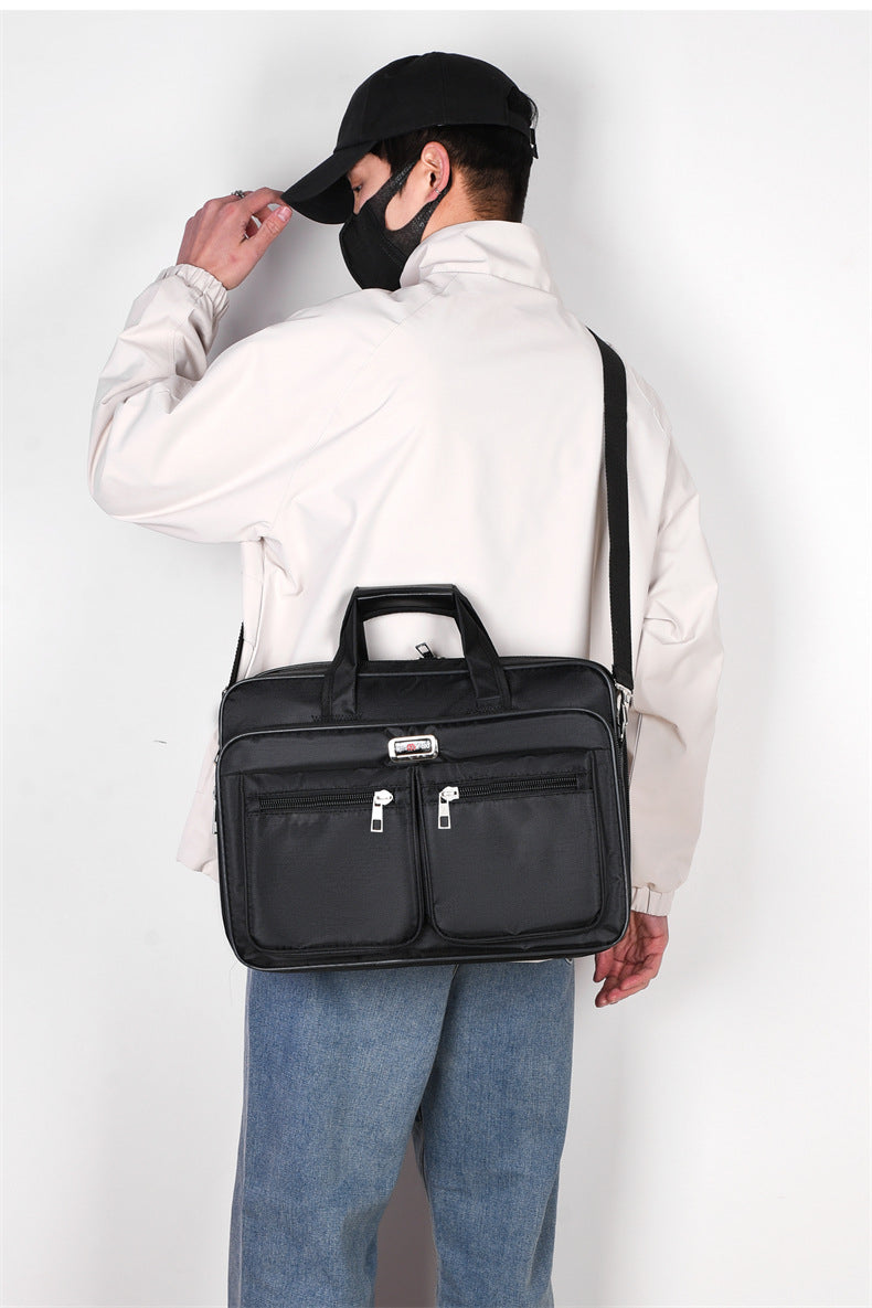 Men's IBG lightweight laptop briefcase with handles and shoulder strap, designed for business travel and professional use.
