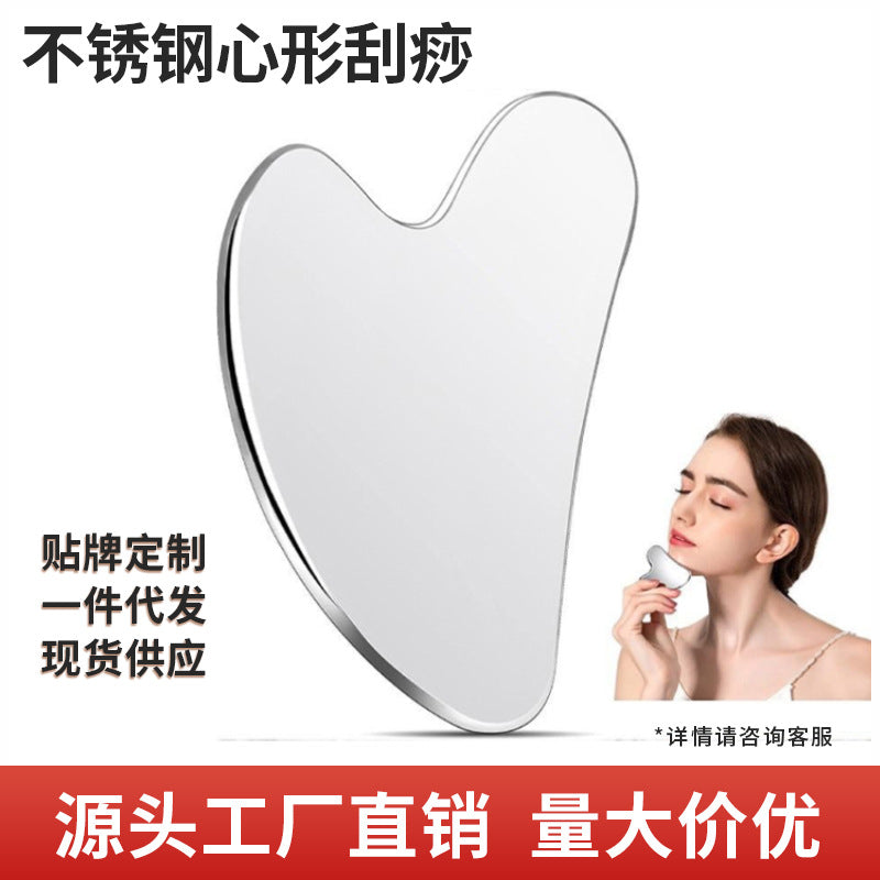 IBG stainless steel Gua Sha massage tool for facial and body massage, featuring smooth, polished surface for skincare and relaxation.