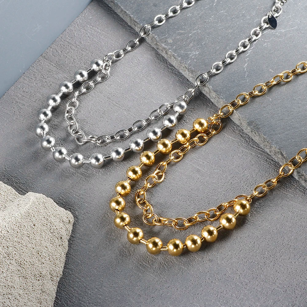 Stainless steel ball chain necklace by IBG, minimal everyday jewelry with small round beads on a sleek chain.